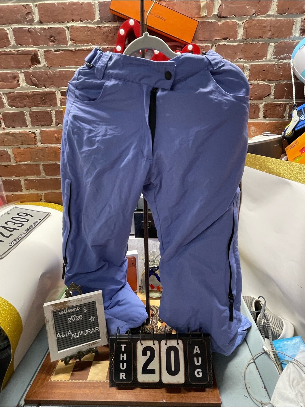 Pulse periwinkle-blue winter snow pants feature an adjustable waist,